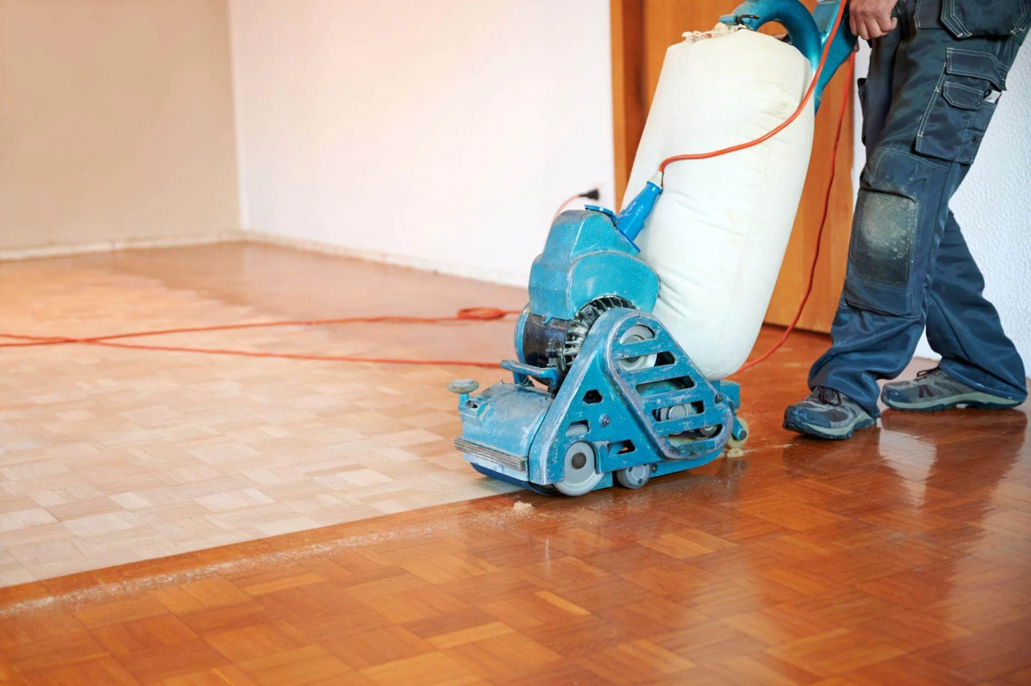 Wood Floor Sanding in Rainham on an oak parquet wood floor using a professional dust-controlled sanding machine.